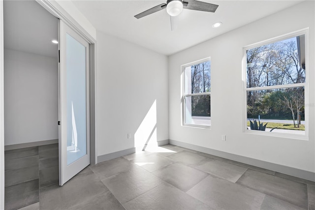11 Ethan Allen Dr, Palm Coast, FL 32164 - empty room featuring a ceiling fan and recessed lighting