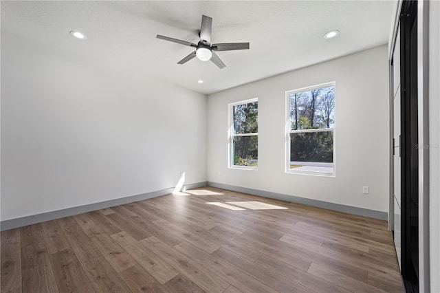 11 Ethan Allen Dr, Palm Coast, FL 32164 - unfurnished room with ceiling fan, wood finished floors, and recessed lighting