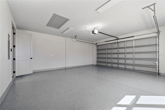11 Ethan Allen Dr, Palm Coast, FL 32164 - garage with a garage door opener and baseboards