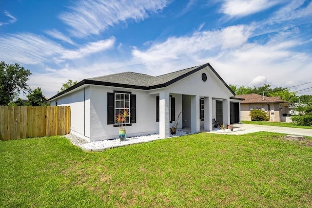33 Bud Field Dr, Palm Coast, FL 32137 - single story home with driveway, stucco siding, and an attached garage