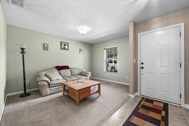 33 Bud Field Dr, Palm Coast, FL 32137 - carpeted living room featuring a textured ceiling and baseboards