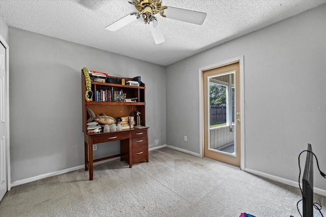 33 Bud Field Dr, Palm Coast, FL 32137 - office area with carpet, a textured ceiling, ceiling fan, and baseboards