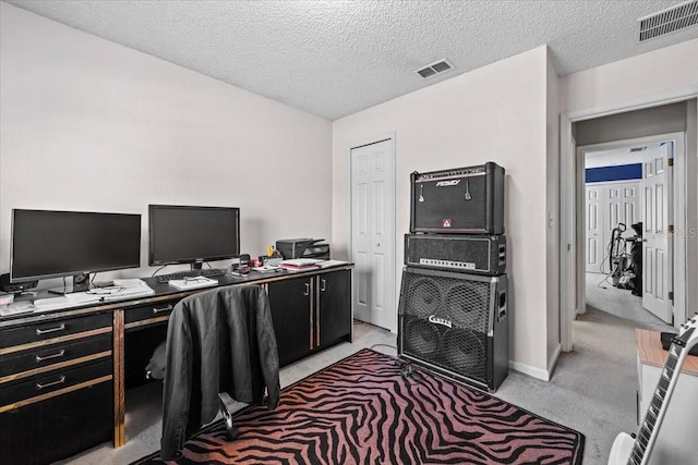 33 Bud Field Dr, Palm Coast, FL 32137 - office featuring light colored carpet, a textured ceiling, and baseboards