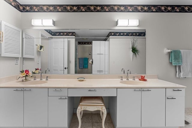 2934 Oceans Trce, Daytona Beach Shores, FL 32118 - bathroom featuring double vanity and a stall shower