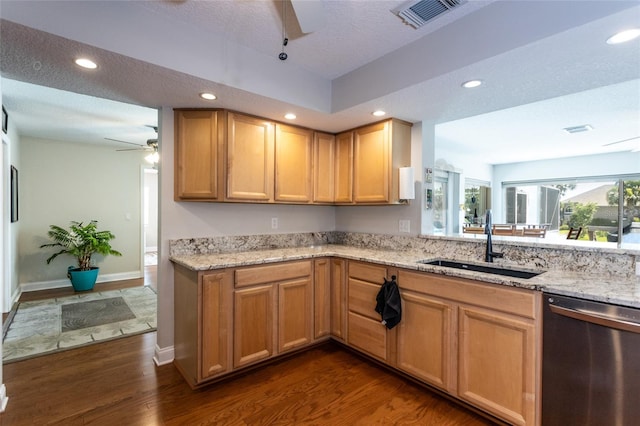 40 Cloverdale Ct N, Palm Coast, FL 32137 - kitchen featuring stainless steel dishwasher, a ceiling fan, a sink, dark wood-type flooring, and recessed lighting