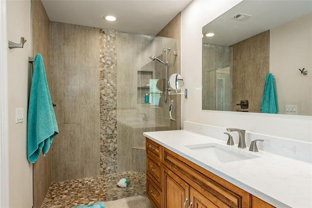 40 Cloverdale Ct N, Palm Coast, FL 32137 - full bathroom featuring vanity, a walk in shower, and recessed lighting