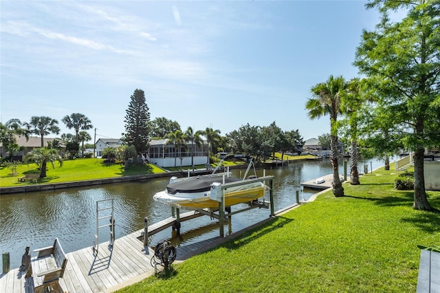 40 Cloverdale Ct N, Palm Coast, FL 32137 - dock area with boat lift, a water view, a lawn, and a residential view