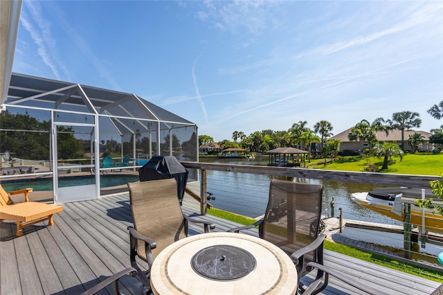 40 Cloverdale Ct N, Palm Coast, FL 32137 - dock featuring an outdoor pool, glass enclosure, and a water view