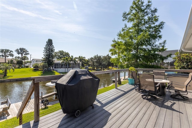 40 Cloverdale Ct N, Palm Coast, FL 32137 - deck with a water view and grilling area