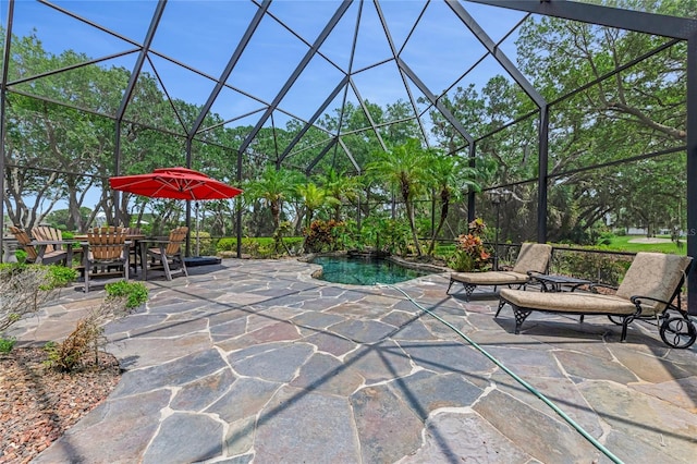 129 Front St, Palm Coast, FL 32137 - view of patio featuring a hot tub and glass enclosure