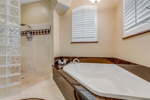 129 Front St, Palm Coast, FL 32137 - full bath with a bath, walk in shower, and tile patterned floors