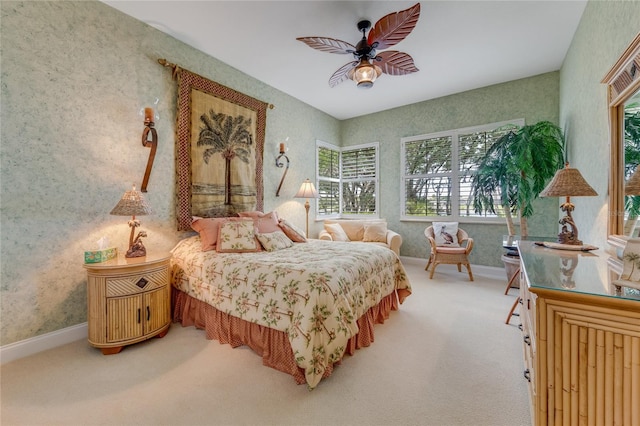 129 Front St, Palm Coast, FL 32137 - carpeted bedroom featuring wallpapered walls, ceiling fan, and baseboards