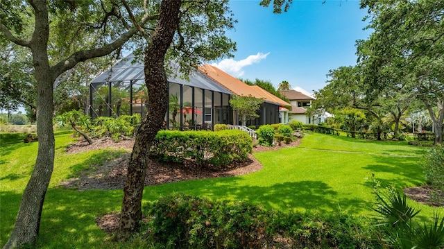 129 Front St, Palm Coast, FL 32137 - view of grassy yard with a lanai