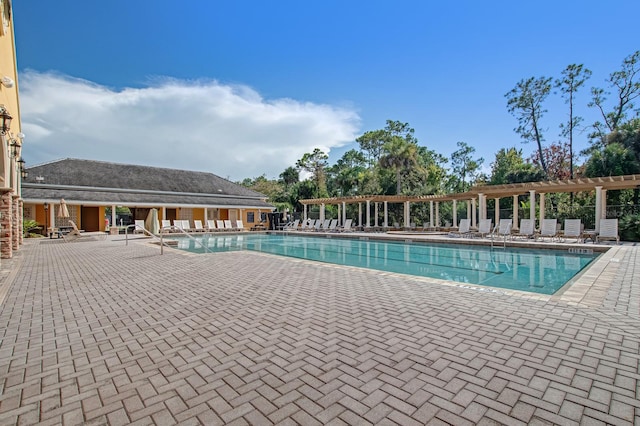 129 Front St, Palm Coast, FL 32137 - community pool with a pergola and a patio area