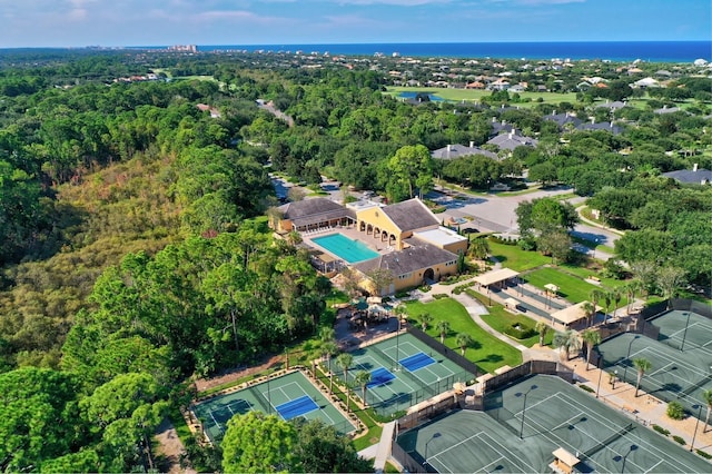 129 Front St, Palm Coast, FL 32137 - view of property location with a pool and a heavily wooded area