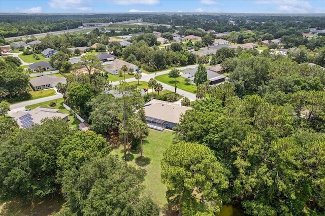 49 Ludlow Ln W, Palm Coast, FL 32137 - aerial view of property and surrounding area with nearby suburban area