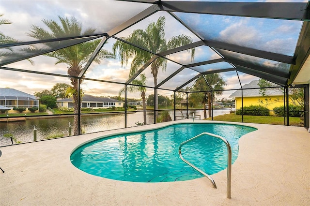 29 Cherrytree Ct, Palm Coast, FL 32137 - swimming pool featuring a water view, a patio, and a lanai