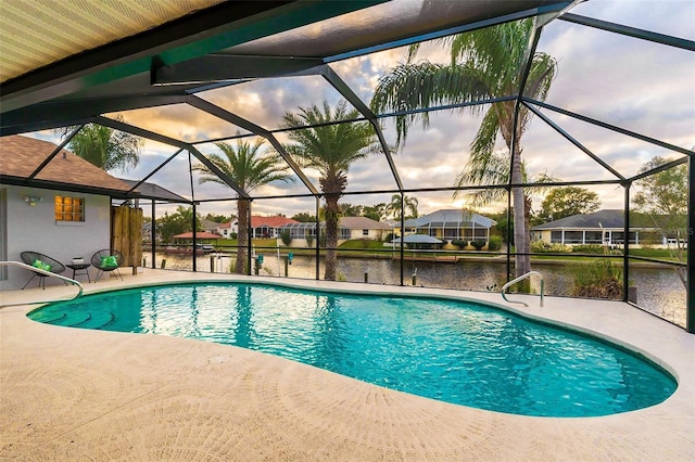 29 Cherrytree Ct, Palm Coast, FL 32137 - swimming pool featuring a patio area, a water view, glass enclosure, and a residential view