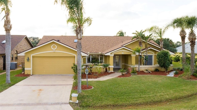 29 Cherrytree Ct, Palm Coast, FL 32137 - ranch-style home with central AC, stucco siding, concrete driveway, an attached garage, and a front yard