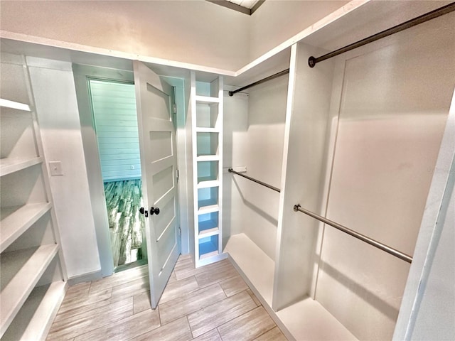 101 Beechers Point Dr, Welaka, FL 32193 - walk in closet with wood tiled floors