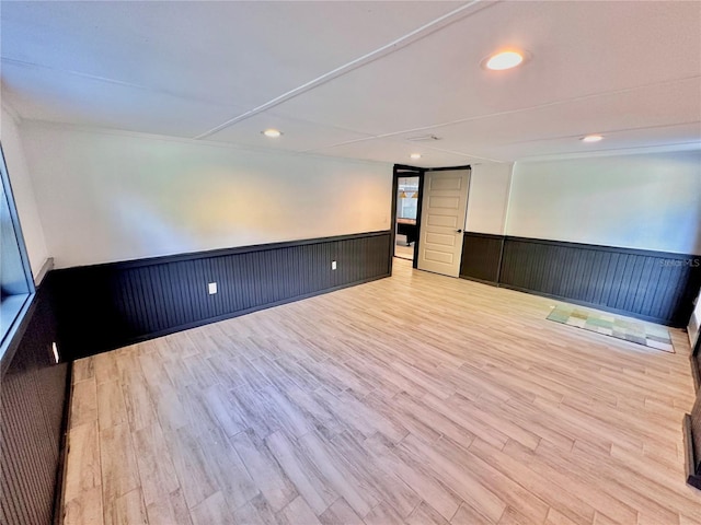 101 Beechers Point Dr, Welaka, FL 32193 - spare room with a wainscoted wall, light wood-style floors, and recessed lighting