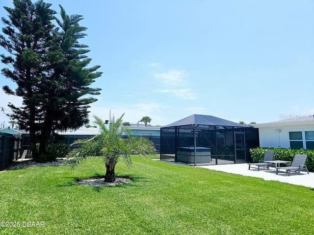 13 Sunrise Ave, Ormond Beach, FL 32176 - view of yard with a patio, glass enclosure, and a hot tub
