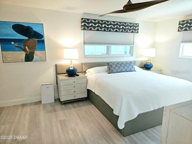 13 Sunrise Ave, Ormond Beach, FL 32176 - bedroom featuring wood finished floors, baseboards, and ceiling fan