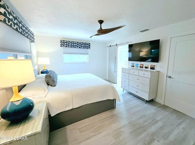 13 Sunrise Ave, Ormond Beach, FL 32176 - bedroom featuring wood finished floors and a ceiling fan