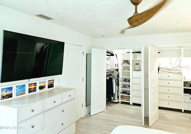 13 Sunrise Ave, Ormond Beach, FL 32176 - bedroom featuring light wood-type flooring, a closet, and ceiling fan