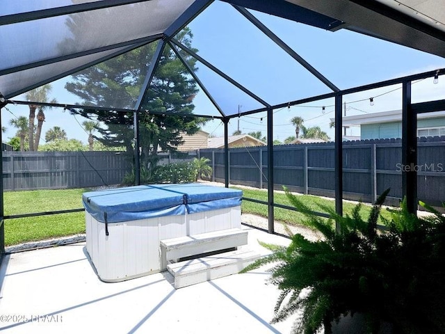 13 Sunrise Ave, Ormond Beach, FL 32176 - view of patio / terrace featuring a hot tub and a lanai