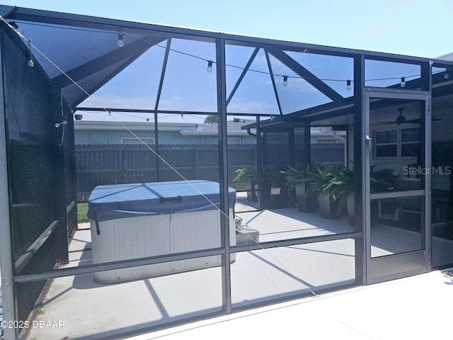 13 Sunrise Ave, Ormond Beach, FL 32176 - view of patio with a hot tub and a lanai