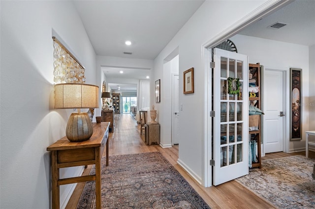 100 Las Casitas Blvd, Palm Coast, FL 32137 - hallway featuring light wood-type flooring and recessed lighting