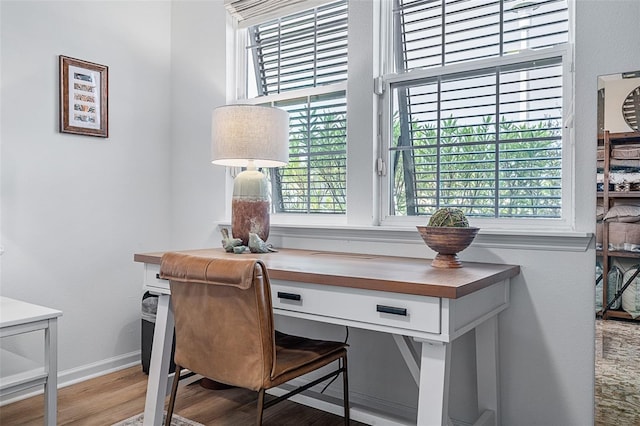 100 Las Casitas Blvd, Palm Coast, FL 32137 - office space featuring plenty of natural light, wood finished floors, and baseboards