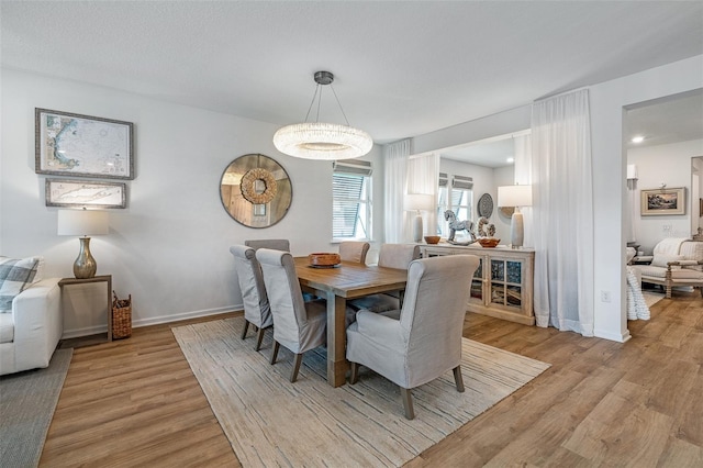 100 Las Casitas Blvd, Palm Coast, FL 32137 - dining area featuring wood finished floors and baseboards