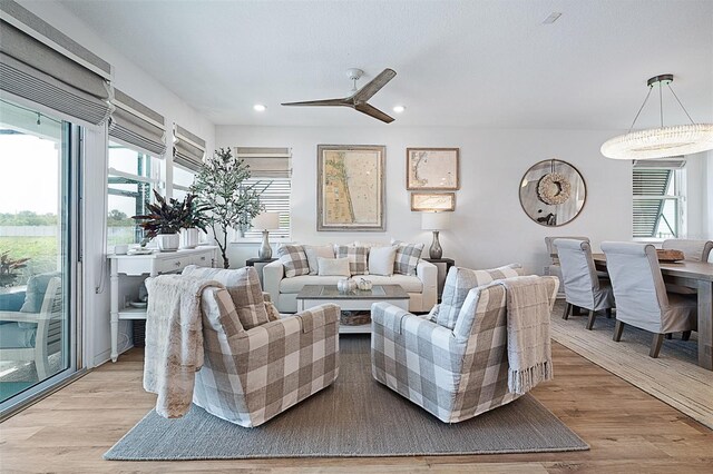 100 Las Casitas Blvd, Palm Coast, FL 32137 - living room with light wood-type flooring, a ceiling fan, and recessed lighting