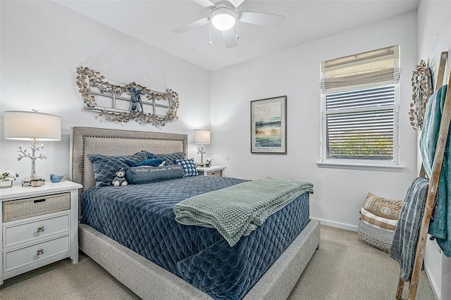 100 Las Casitas Blvd, Palm Coast, FL 32137 - bedroom with light colored carpet, baseboards, and a ceiling fan