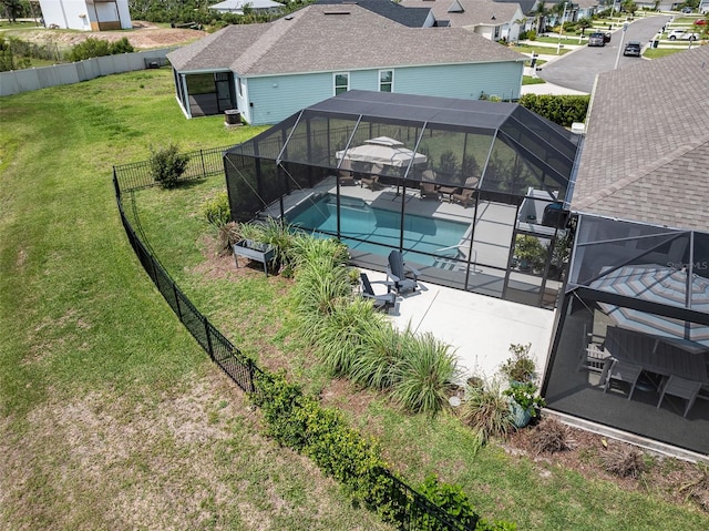 100 Las Casitas Blvd, Palm Coast, FL 32137 - view of pool featuring a patio, a residential view, and a lanai