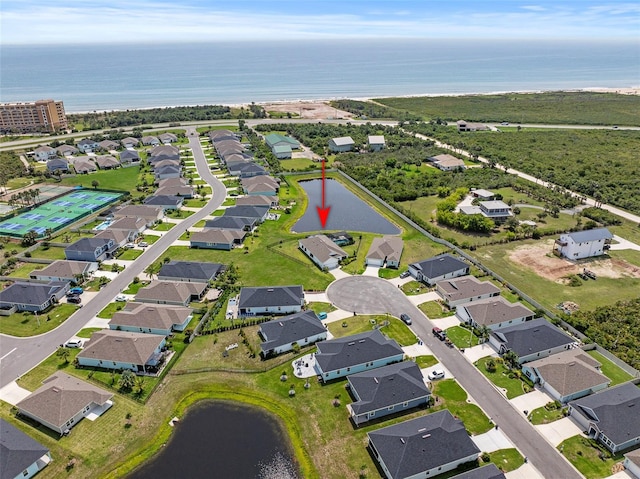 100 Las Casitas Blvd, Palm Coast, FL 32137 - aerial view of property and surrounding area featuring a large body of water and nearby suburban area