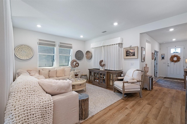100 Las Casitas Blvd, Palm Coast, FL 32137 - living area featuring light wood finished floors and recessed lighting