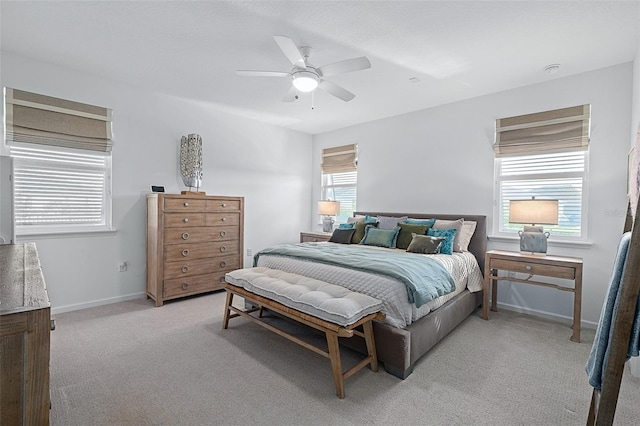 100 Las Casitas Blvd, Palm Coast, FL 32137 - bedroom featuring light carpet, ceiling fan, and baseboards