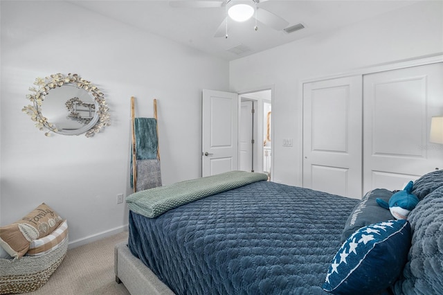 100 Las Casitas Blvd, Palm Coast, FL 32137 - carpeted bedroom with baseboards, a ceiling fan, and a closet