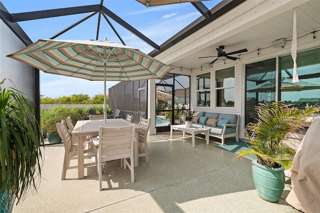 100 Las Casitas Blvd, Palm Coast, FL 32137 - view of patio featuring glass enclosure, outdoor lounge area, a ceiling fan, outdoor dining area, and a swimming pool