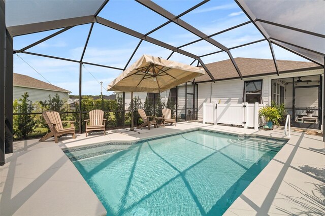 100 Las Casitas Blvd, Palm Coast, FL 32137 - outdoor pool featuring a patio, ceiling fan, and a lanai
