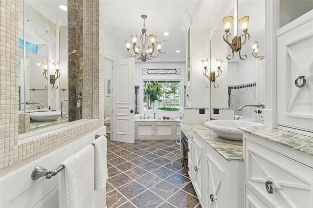 140 Monterey Bay Ln, Green Cove Springs, FL 32043 - bathroom featuring a chandelier, vanity, recessed lighting, and a tub