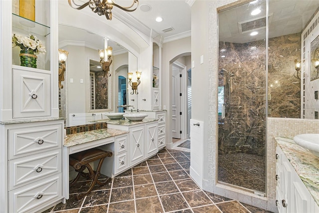 140 Monterey Bay Ln, Green Cove Springs, FL 32043 - bathroom featuring crown molding, a shower stall, two vanities, and a chandelier