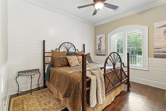 140 Monterey Bay Ln, Green Cove Springs, FL 32043 - bedroom with ornamental molding, dark wood finished floors, wood walls, and a ceiling fan