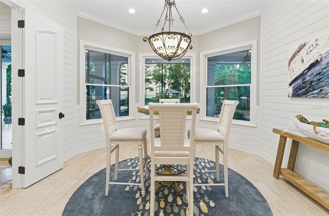 140 Monterey Bay Ln, Green Cove Springs, FL 32043 - dining area featuring light wood-style floors, ornamental molding, recessed lighting, and a chandelier