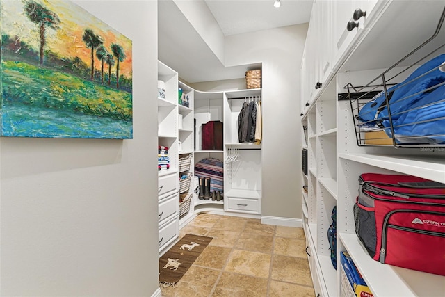 140 Monterey Bay Ln, Green Cove Springs, FL 32043 - spacious closet featuring light stone finish flooring