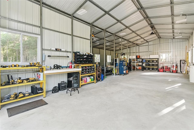 140 Monterey Bay Ln, Green Cove Springs, FL 32043 - garage with a workshop area and metal wall