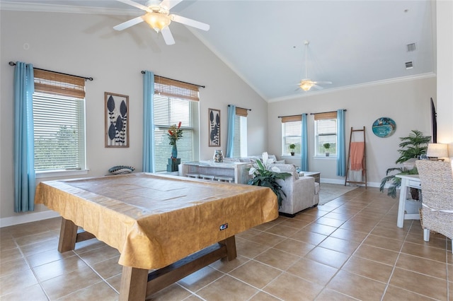 200 Bella Harbor Ct Unit 113, Palm Coast, FL 32137 - recreation room featuring ceiling fan, healthy amount of natural light, light tile patterned floors, lofted ceiling, and crown molding